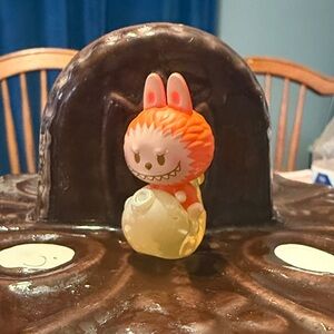 Labubu Pop bean on Koi Fish